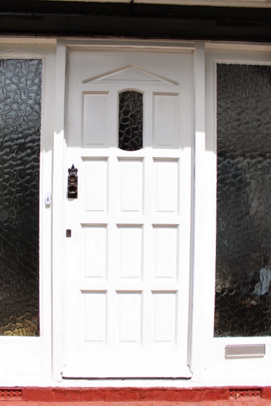 1930s house original front door and lock in the UK.