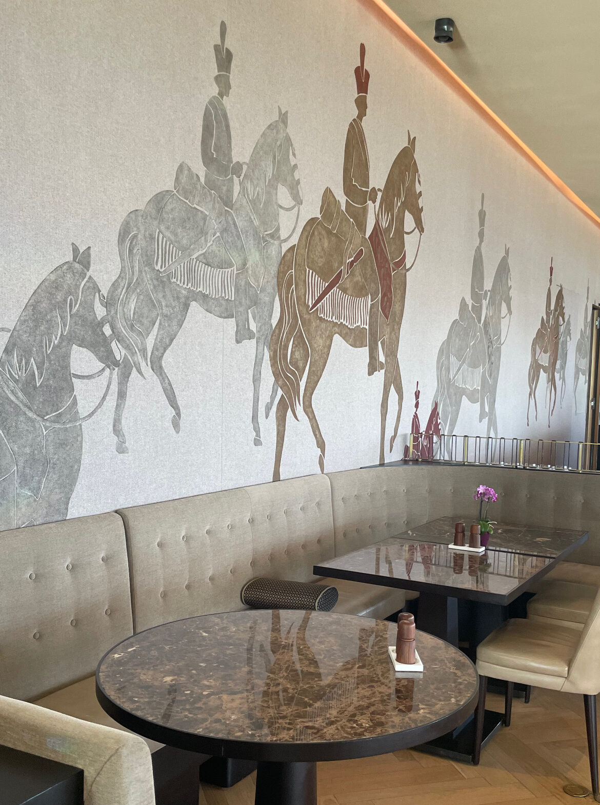 Royal Champagne Hotel & Spa dining room featuring horse rider wallpaper