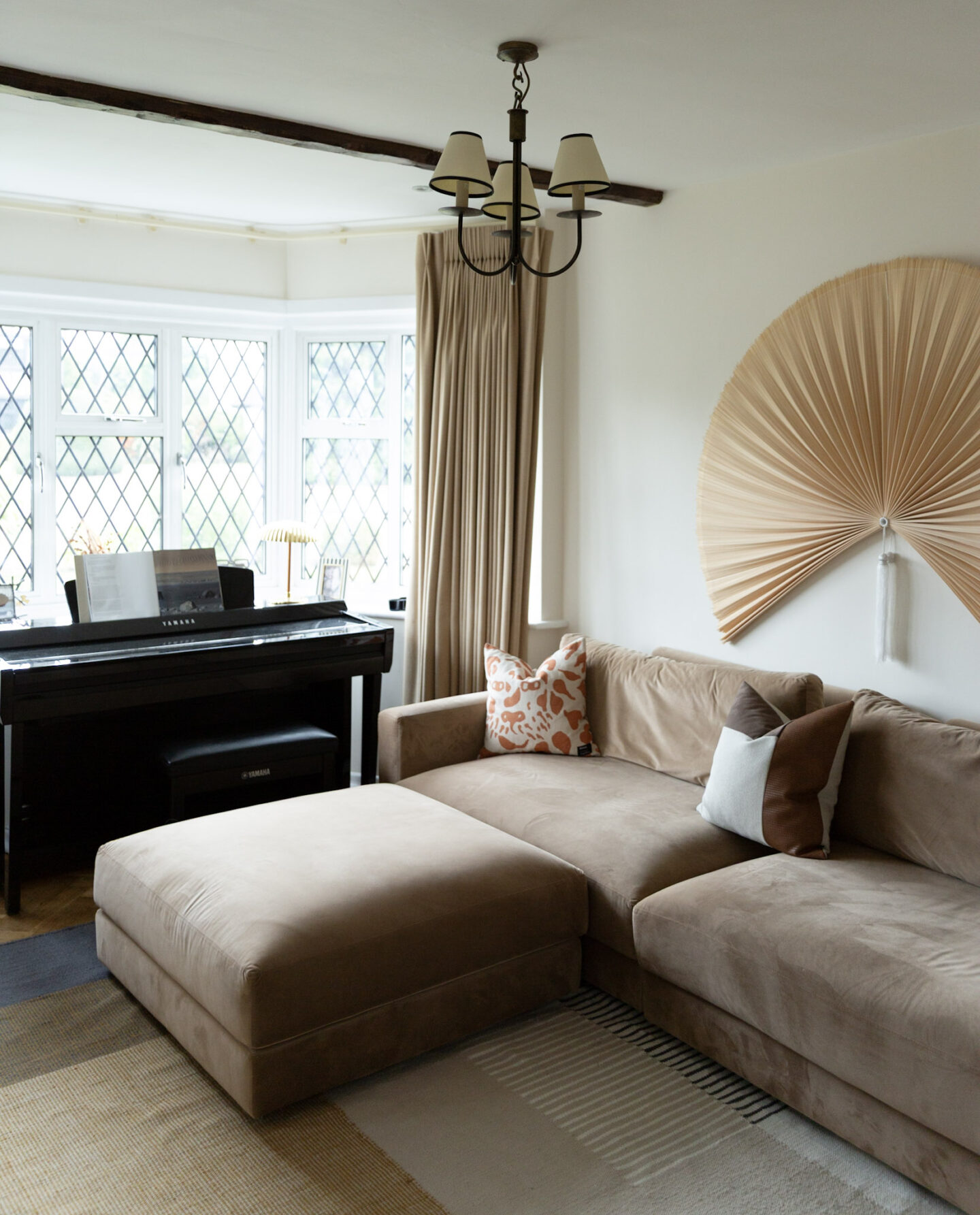 beige velvet sofa with neutral decor