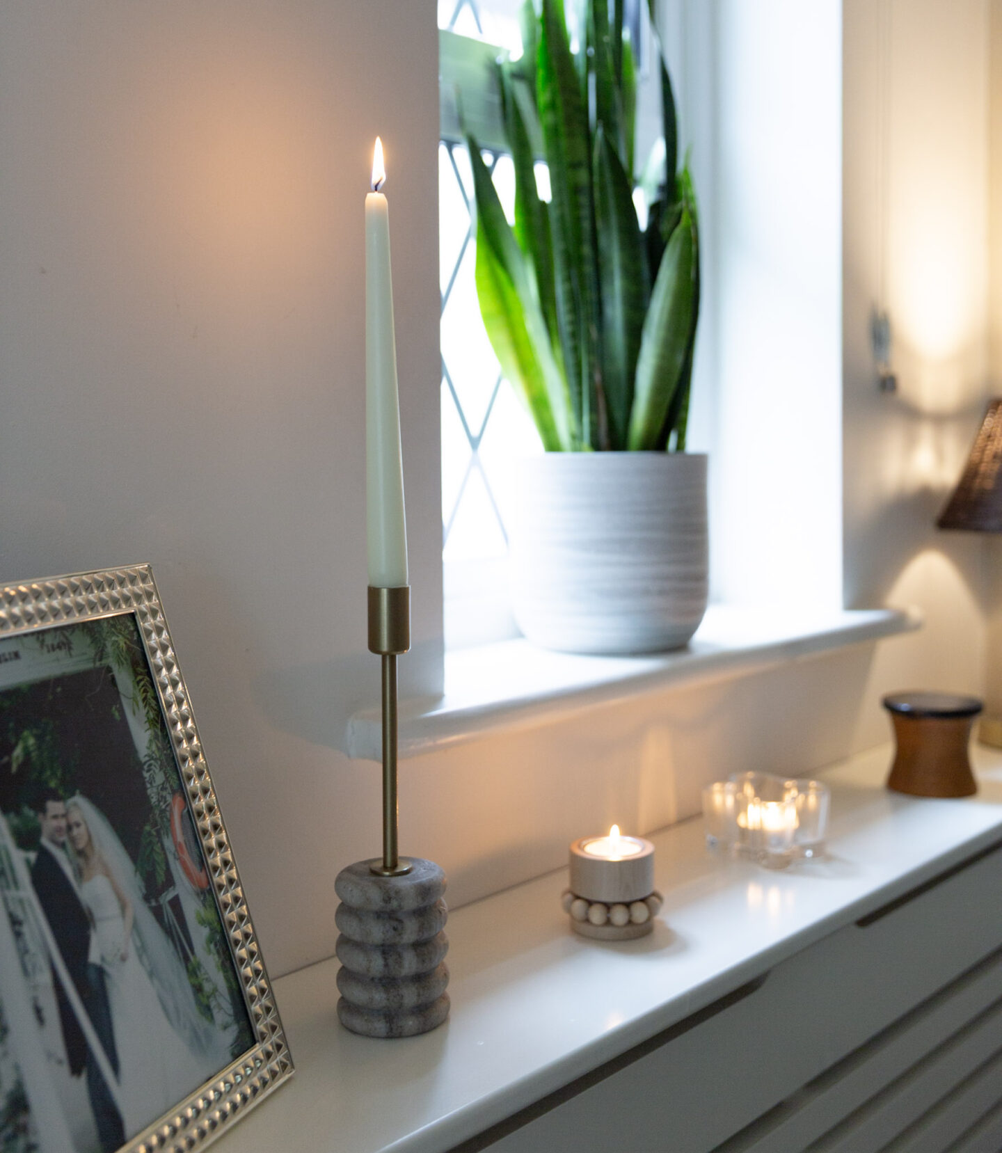 Beige marble candle holders with brushed gold accents for cosy autumn home decor