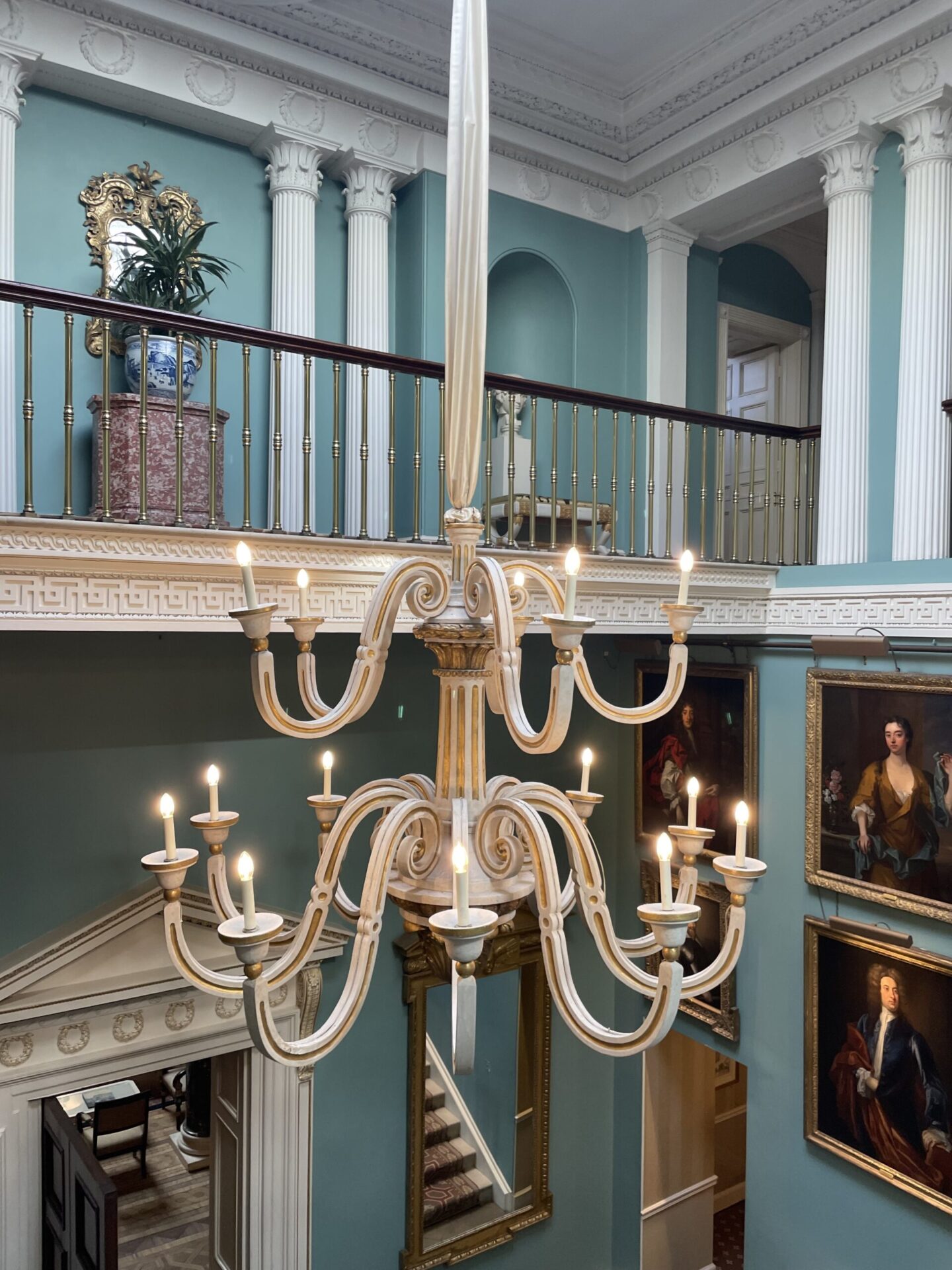 French Chandelier Overlooking The Staircase