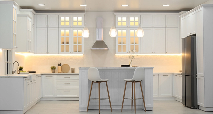 In-Cabinet Lighting in a traditional shaker-style white kitchen. 