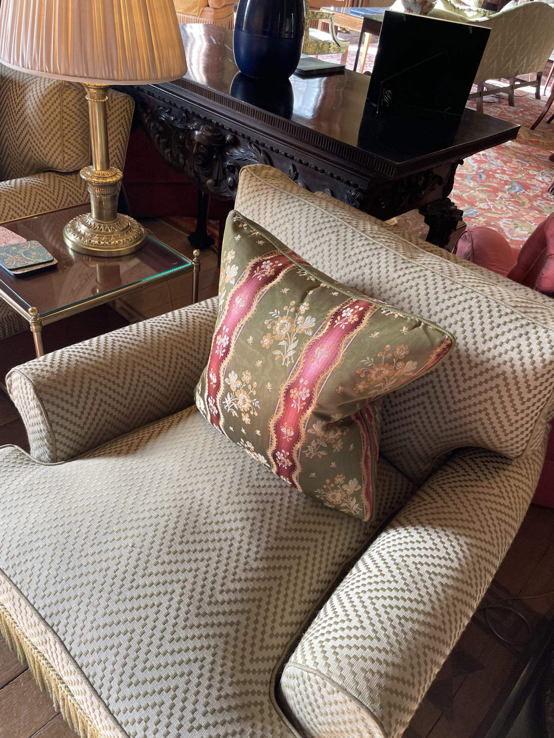 Oriental-style patterned silk cushion on a chair