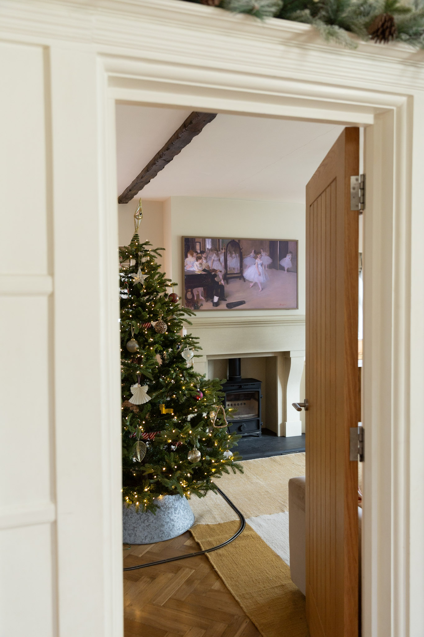 Scandi style Christmas Tree with Eclectic Mix of Gold and Wooden Ornaments