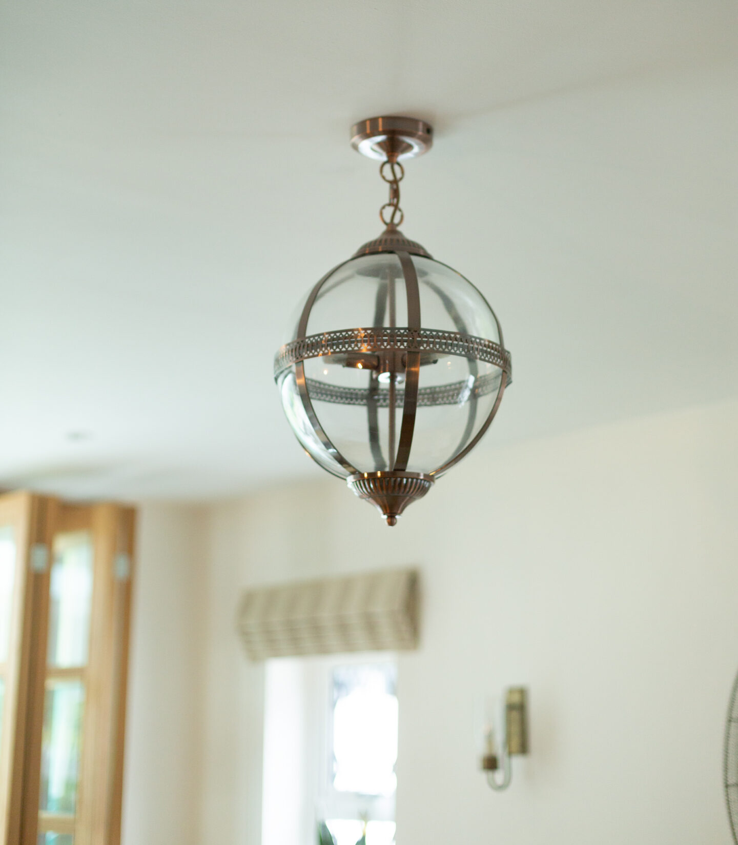 Silver orbit lighting pendant.