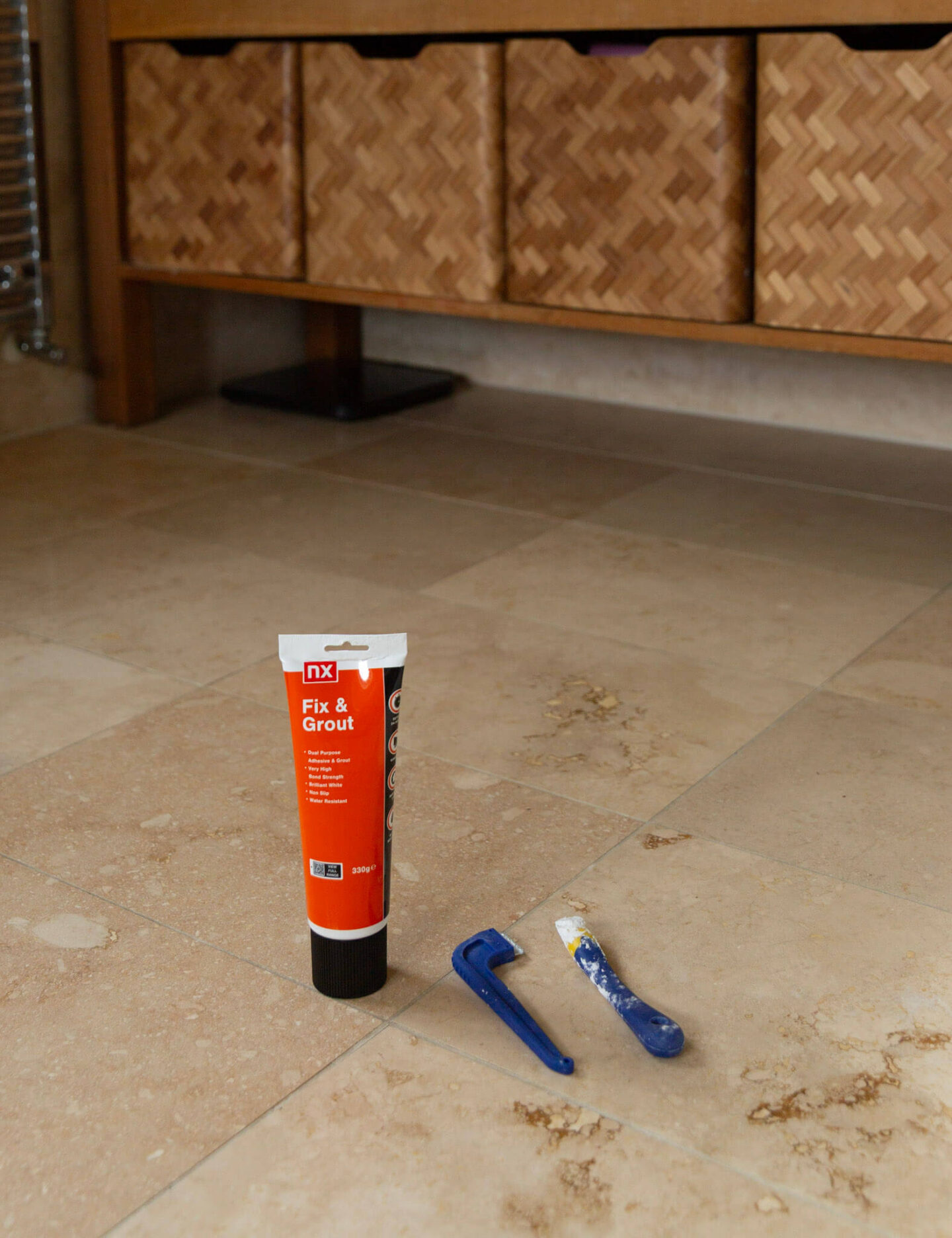 Ready mixed grout, grout scraper and silicon and grout smoother tool for bathroom floor tile repair