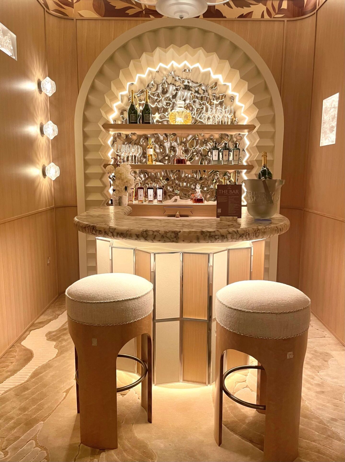 Luxury Lalique-inspired home bar featuring refined materials, clever storage and sophisticated detailing