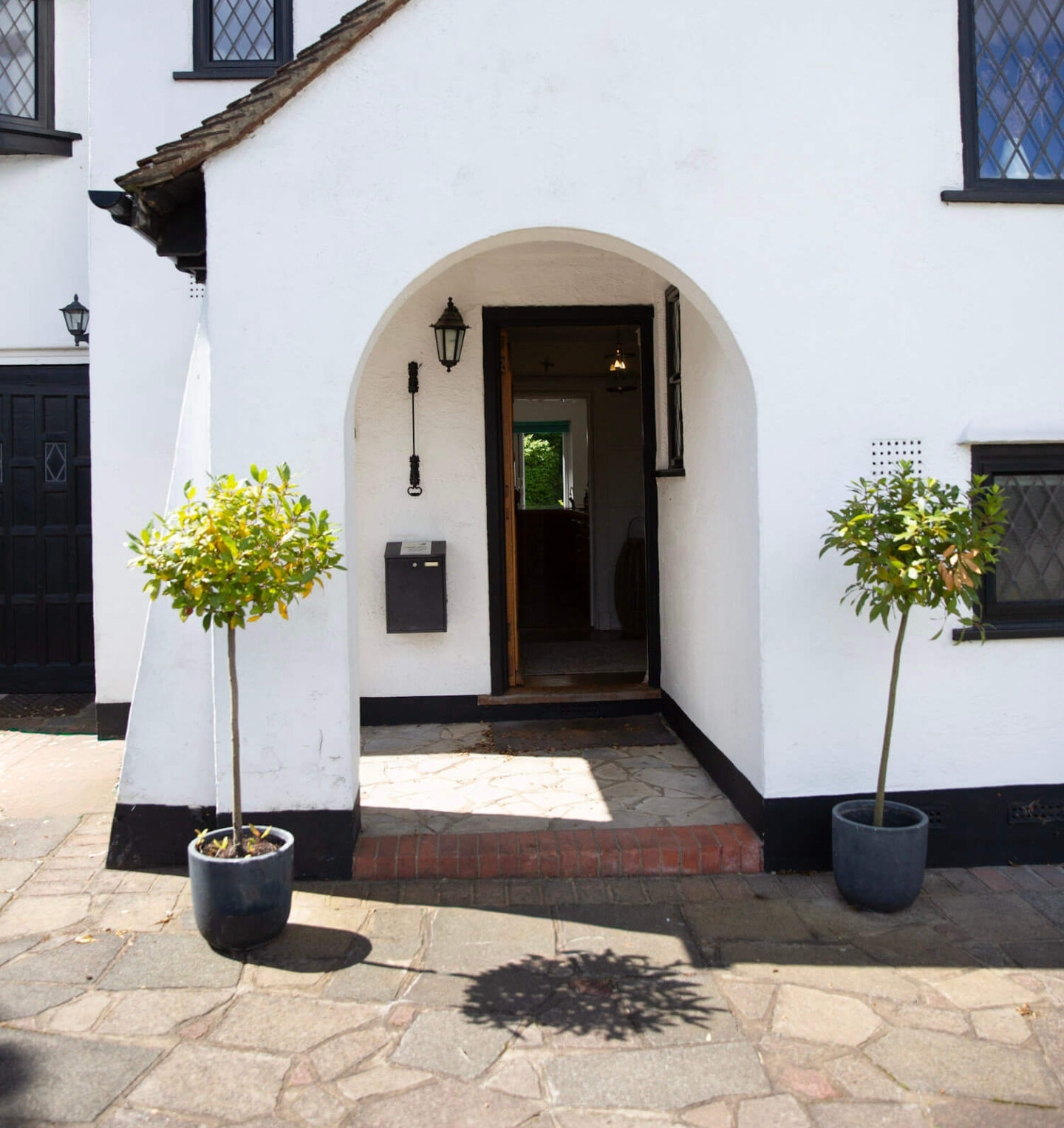 1920s house with an arched entrance to the hallway
