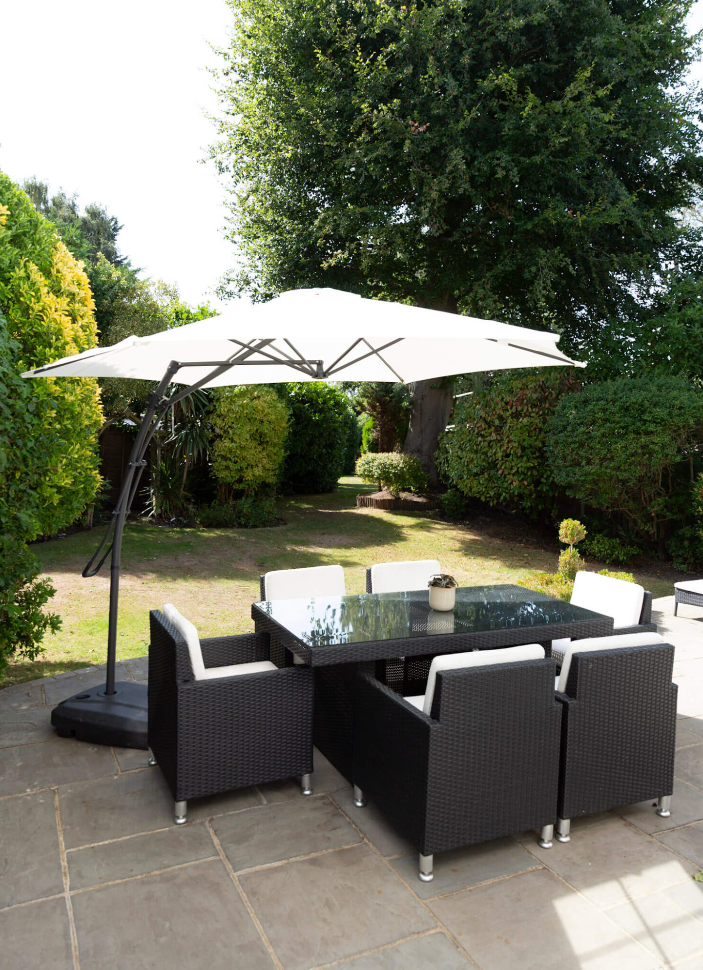 Dry brown lawn and garden table after a hot, dry summer