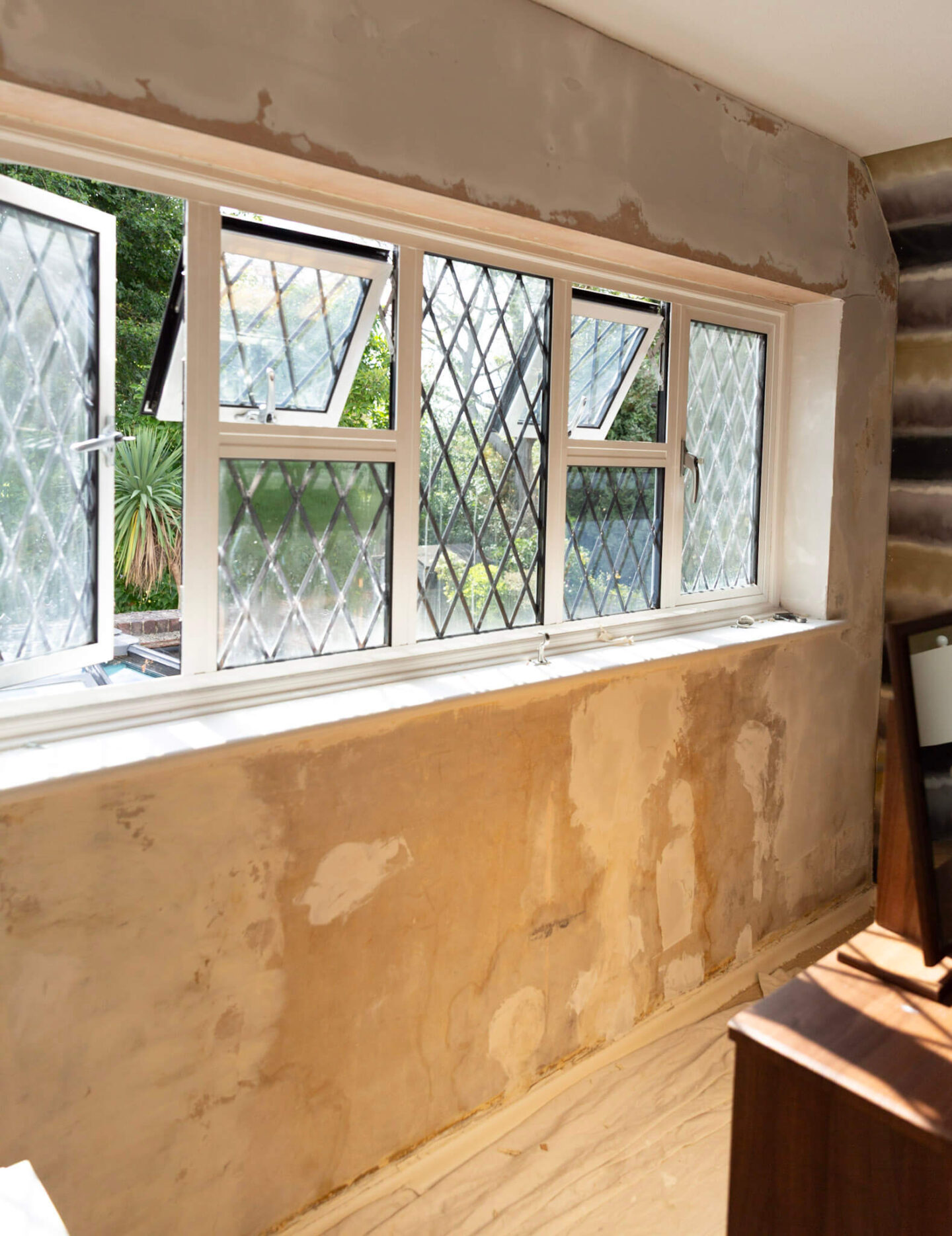 Plastered wall after removing mould