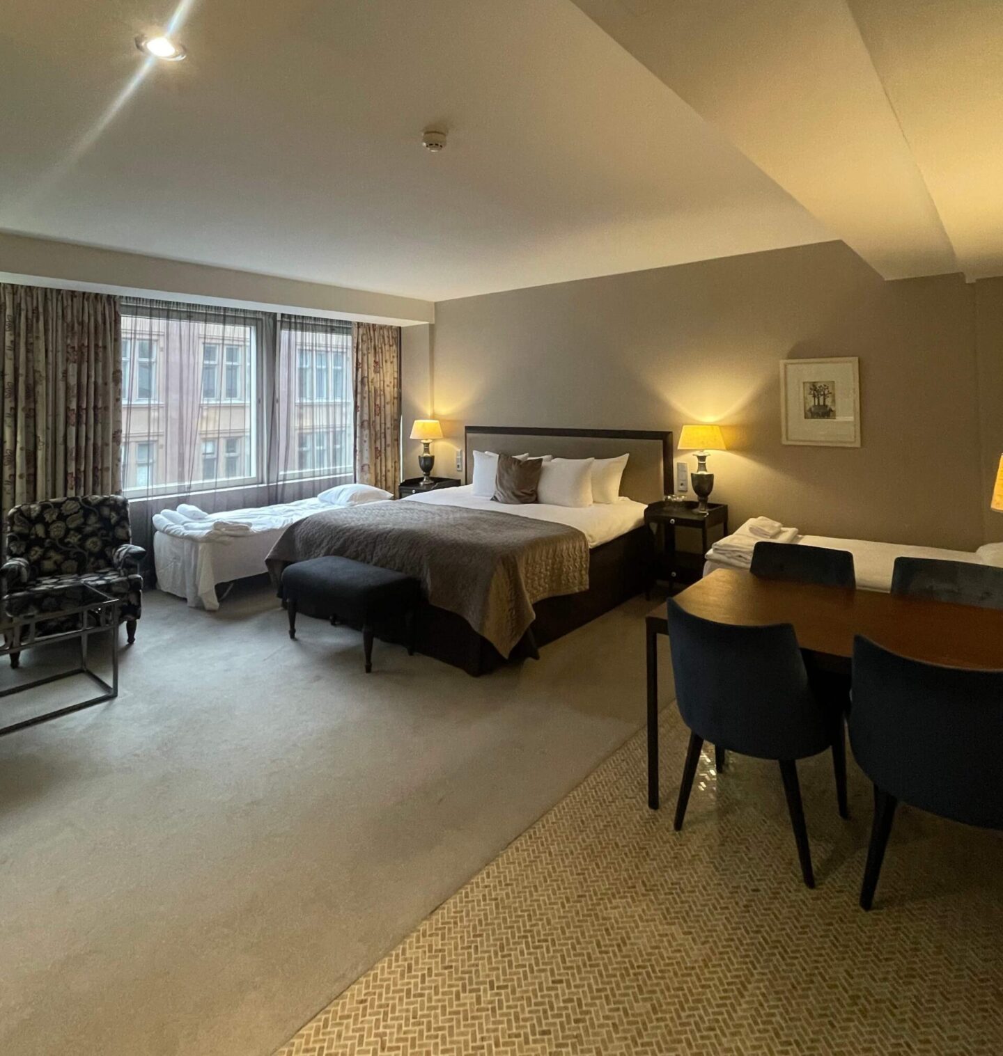 Deluxe room at Hotel Haven Helsinki with beige and black colour scheme